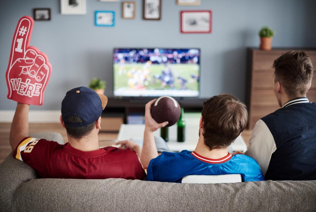 Should you watch football on Thanksgiving? Etiquette expert reveals rules that can divide families