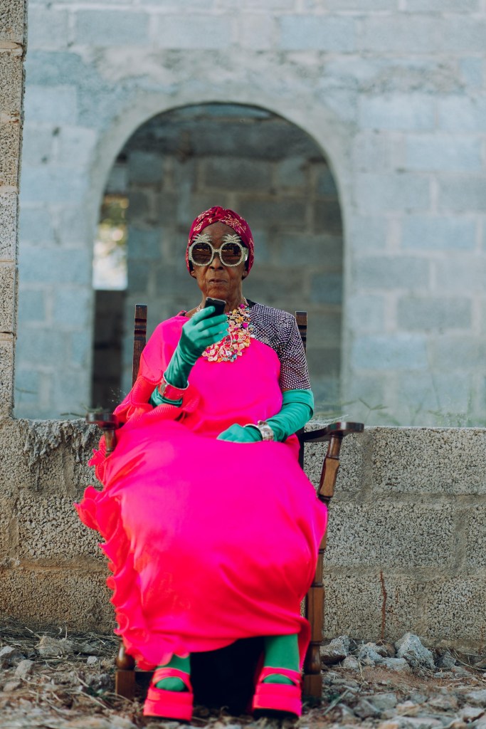 Margret Chola in a pink dress